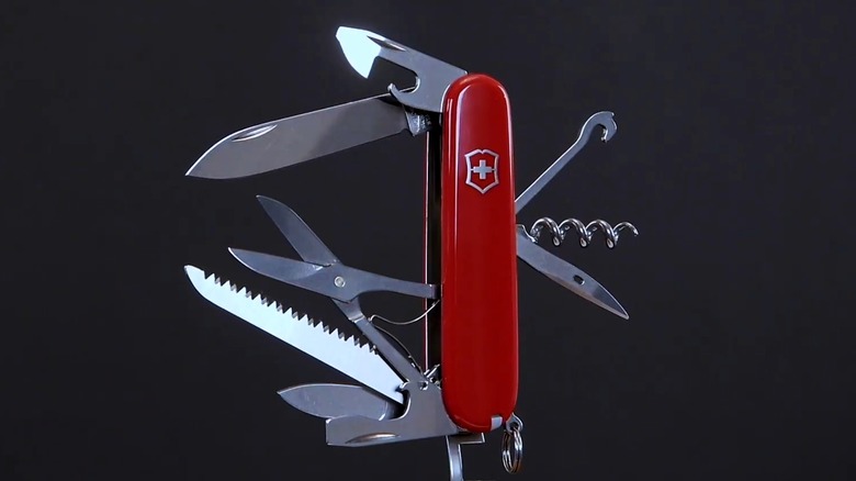 A Victorinox Hunstman knife with its tools open.