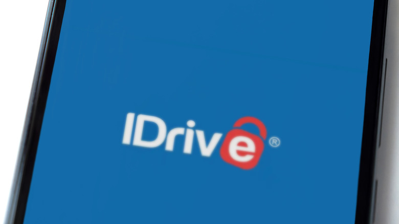 iDrive launch screen on smartphone against white background