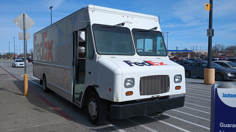 A FedEx truck parked on a city street