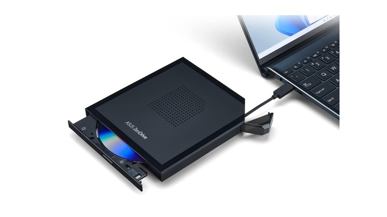 Asus ZenDrive V1M connected to a laptop via the built-in cable