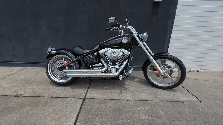 2010 Harley-Davidson Rocker C motorcycle parked on pavement