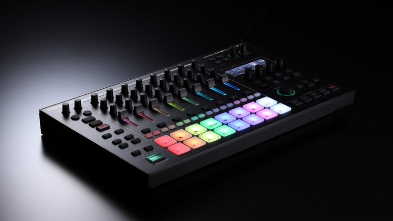 The Roland MC-707 groovebox on a black background.