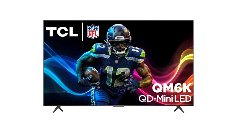A TCL QM6K TV with the image of an American footballer in action.
