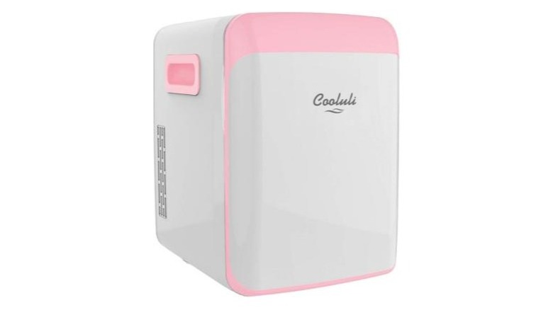 A pink and white Cooluli mini fridge