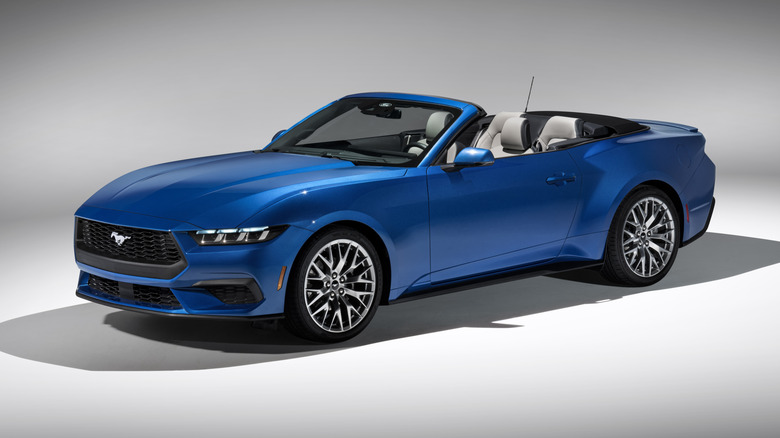 Photo of a blue 2024 Mustang convertible.