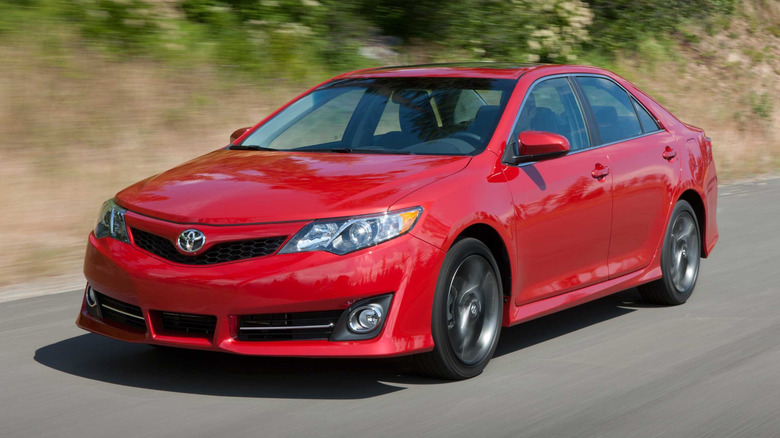 Photo of a red 2012 Toyota Camry SE.