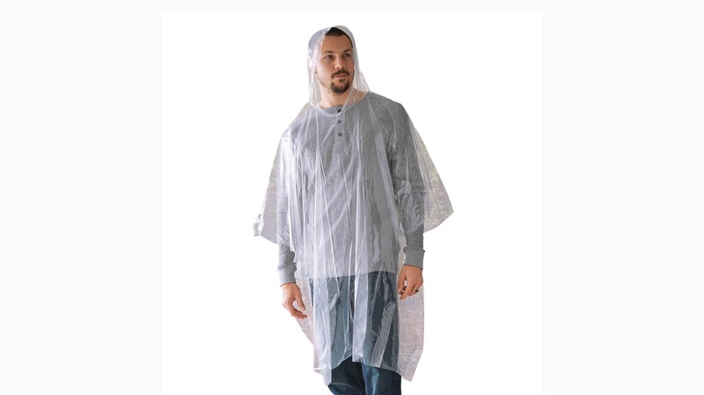 Man wearing a waterproof rain poncho
