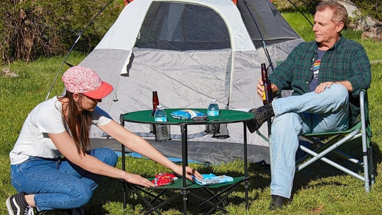 campers using the folding table