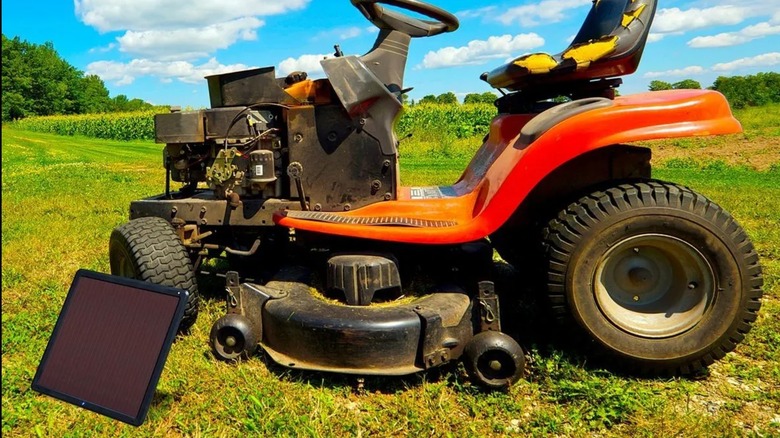 Thunderbolt Solar panel next to a lawnmower