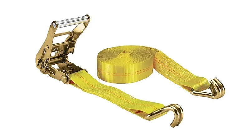 A yellow/golden tie-down against a white background.