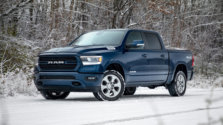 A side on shot of a blue 2019 Ram 1500 parked
