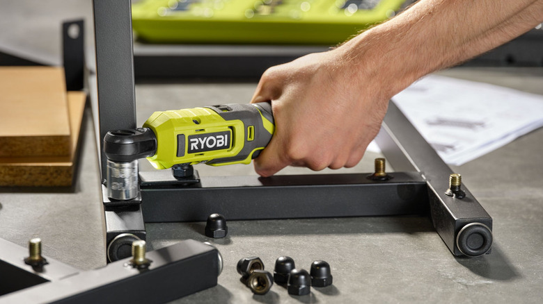 Using the 3/8-inch Light Duty Ratchet by Ryobi to assemble furniture.