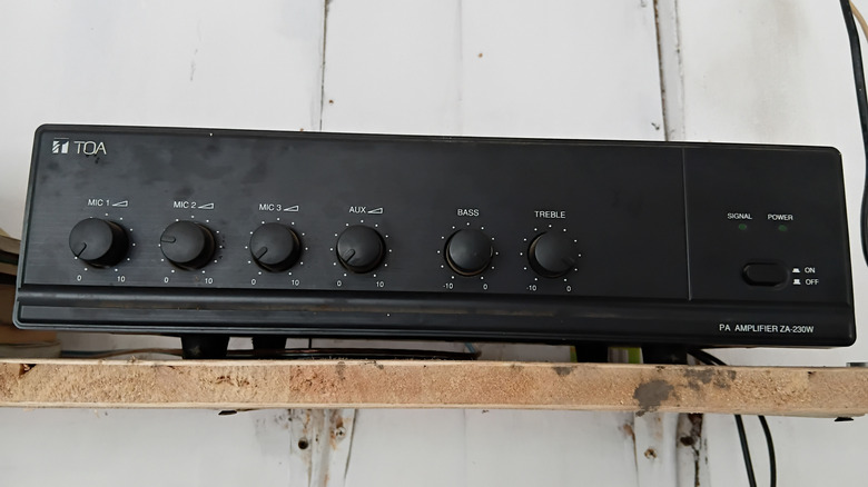 An amplifier placed on a shelf