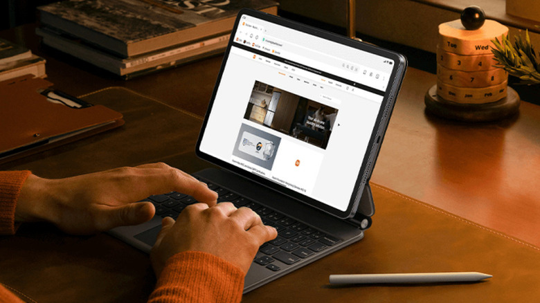 The Xiaomi Pad 8 tablet attached to a keyboard, on a desk