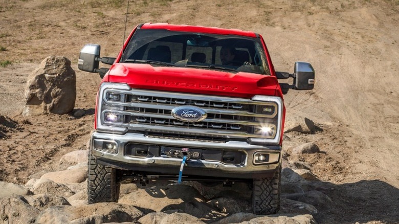 A red F-250 Tremor off road
