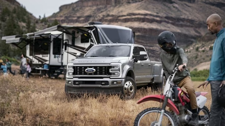 A super duty Ford truck at a camp site
