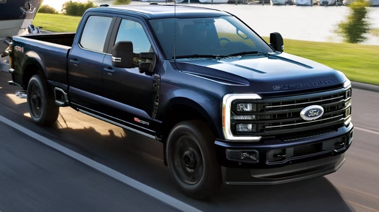 A black Ford F-350 super duty truck