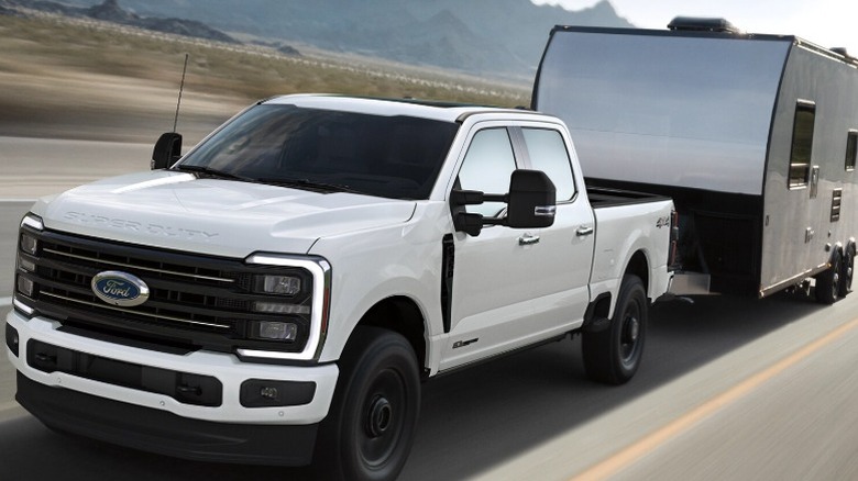 A Ford Super Duty truck towing an RV