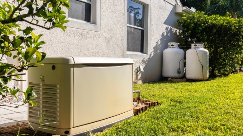 A generator next to a house