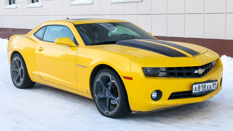 A yellow Chevrolet Camaro V