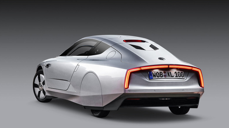 2014 Volkswagen XL-1 on gray background, rear-left 3/4 view