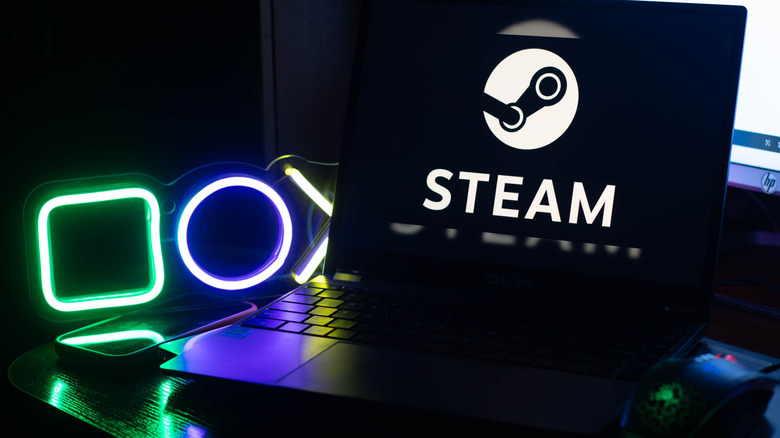 The Steam logo on a laptop.