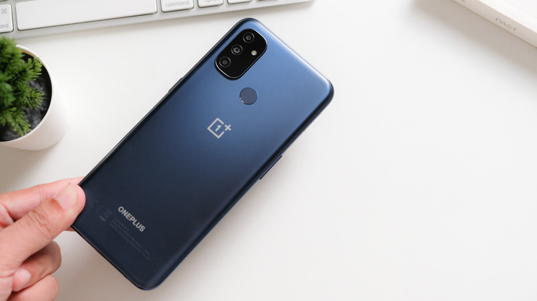 OnePlus Nord N100 mid-range smartphone in blue gray color with rear fingerprint scanner