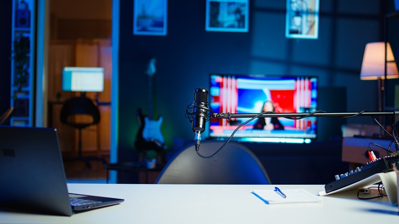 Microphone and laptop on a desk