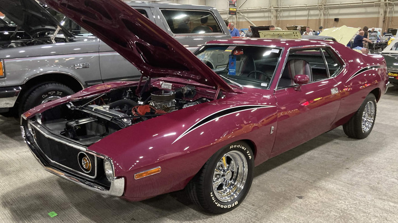 1971 AMC Javelin AMX with hood open, front-left 3/4 view, plum exterior
