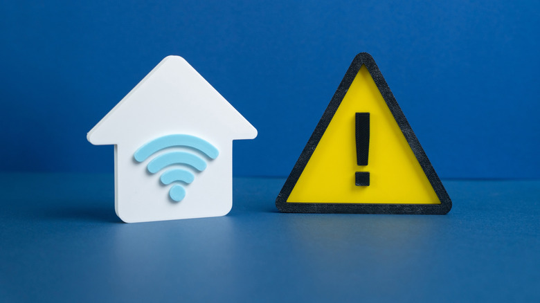 An illustration showing a smart home with a W-Fi signal inside, and a yellow exclamation point next to it, representing an internet outage