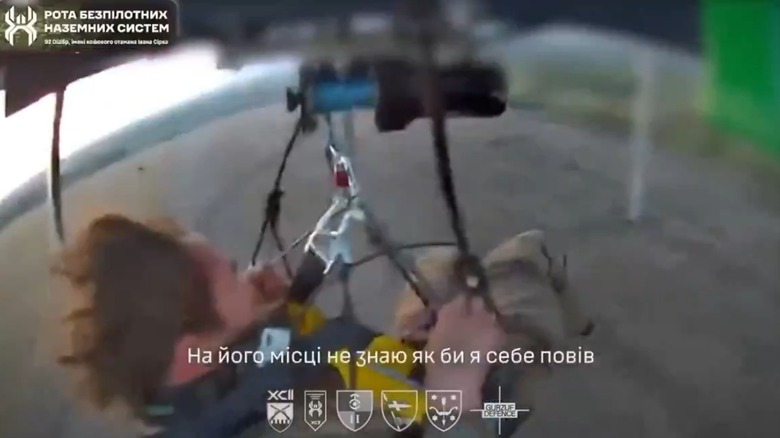 POV shot of a Ukrainian drone carrying an injured soldier to safety