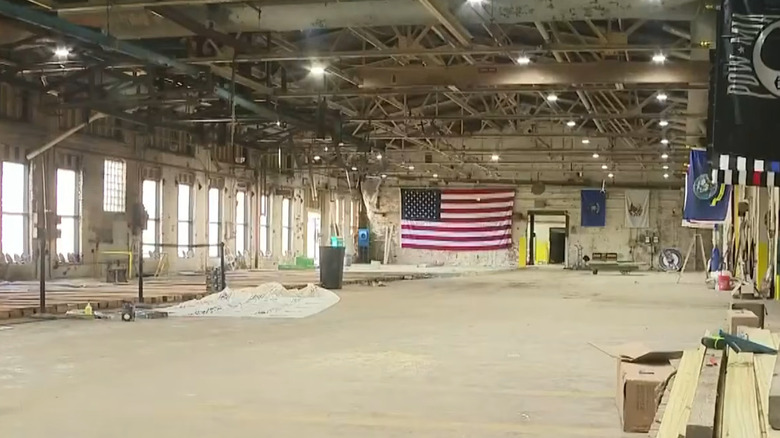 inside the old paper mill being transformed into classic car storage