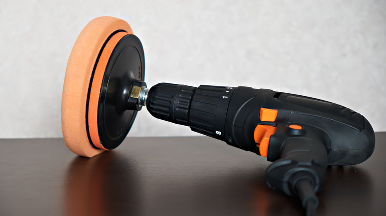 An electric drill with polishing attachment