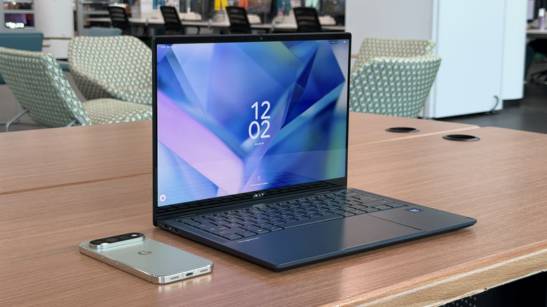 Googlebook and Pixel 11 Pro on a table