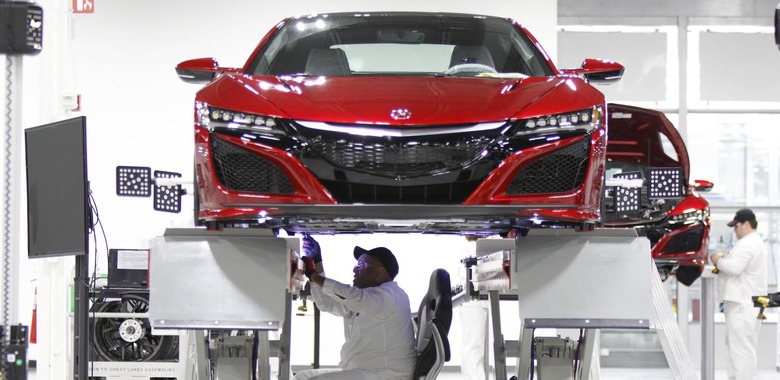 Carl Mason sits in the aligner chair during the NSX wheel alignment