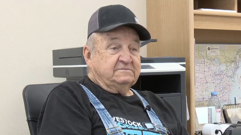Orrin Asmus, 93-year-old truck driver, being interviewed by local news