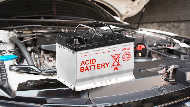 Lead-acid car battery on fan shroud