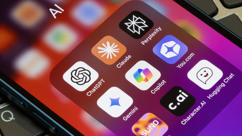 Close up of smartphone showing icons for AI models including ChatGPT, Gemini, Copilot and more.