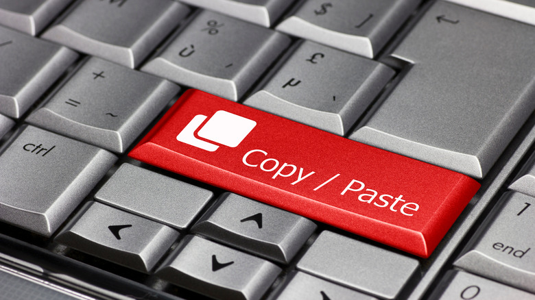 Keyboard with red copy/paste button