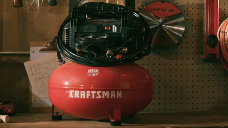 Craftsman air compressor on work bench