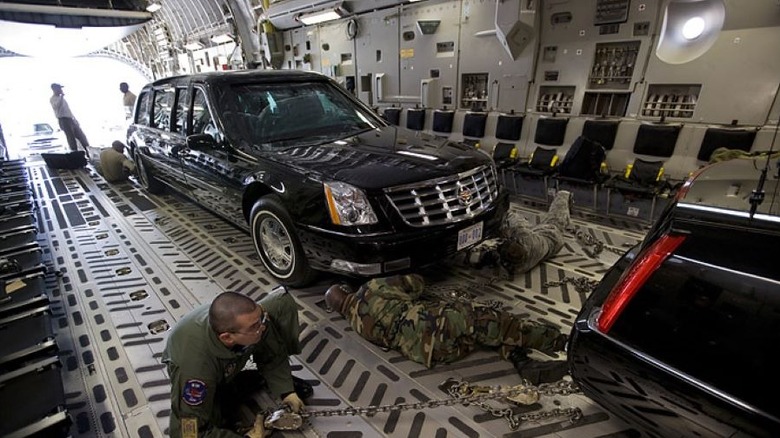 Presidential limousine in cargo hold of aircraft