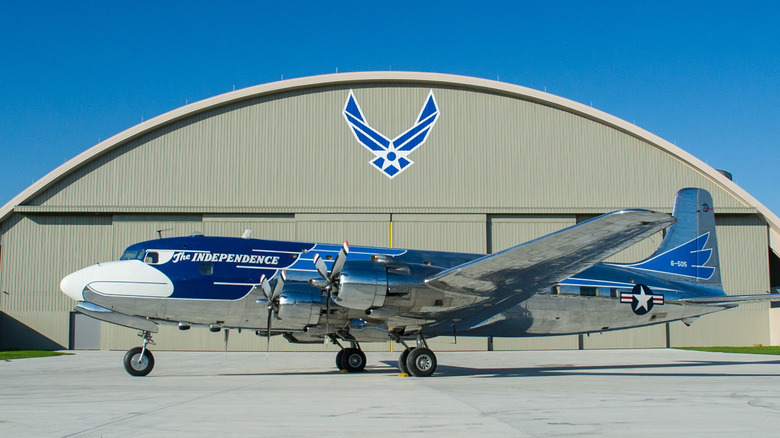 VC-118 Independence parked in front of hangar