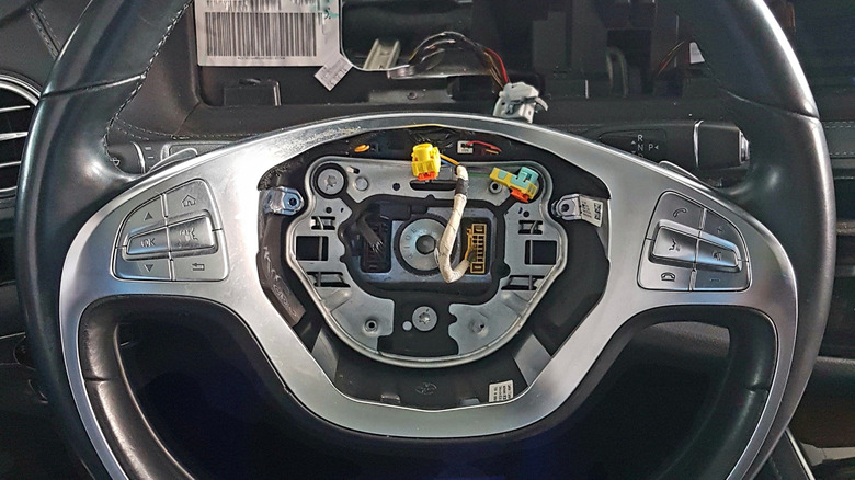 A steering wheel after the airbag has been stolen