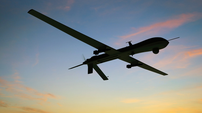 a UAV flying at sunset