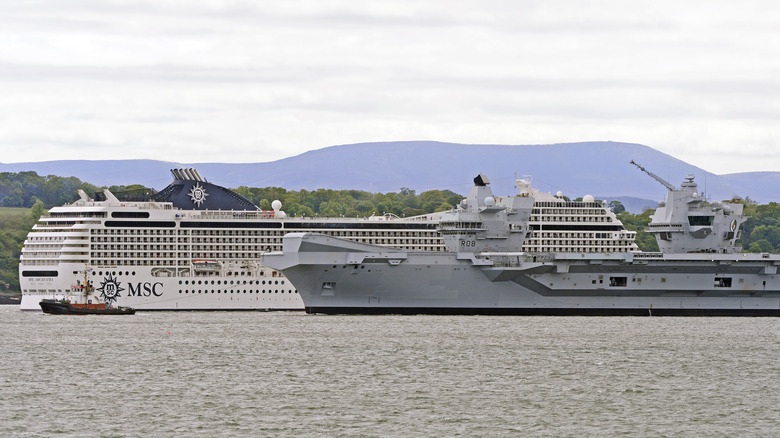 A cruise liner and an aircraft carrier in close proximity