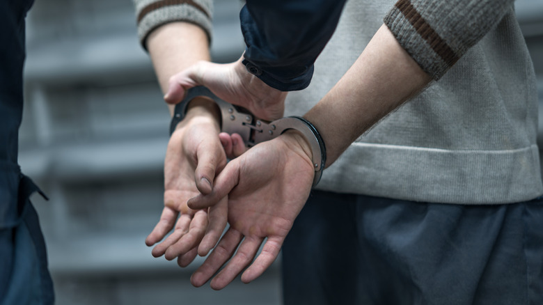 person being put in handcuffs