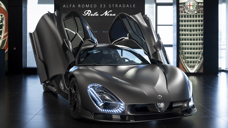 Front 3/4 view of Alfa Romeo 33 Stradale Perla Nera with doors in open position