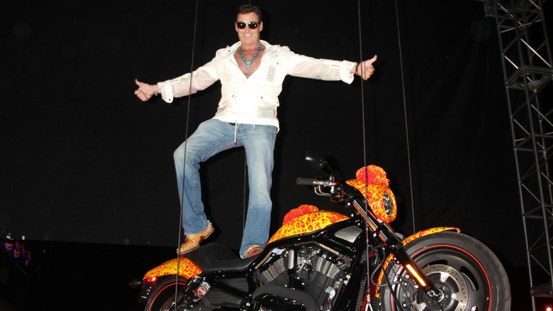 Person posing on Cosmic Starship motorcycle