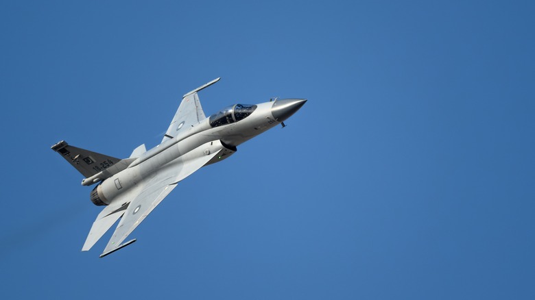 Flying display and aerobatic show of Pakistan Air Force - JF-17 Thunder fighter plane in Bahrain International Airshow