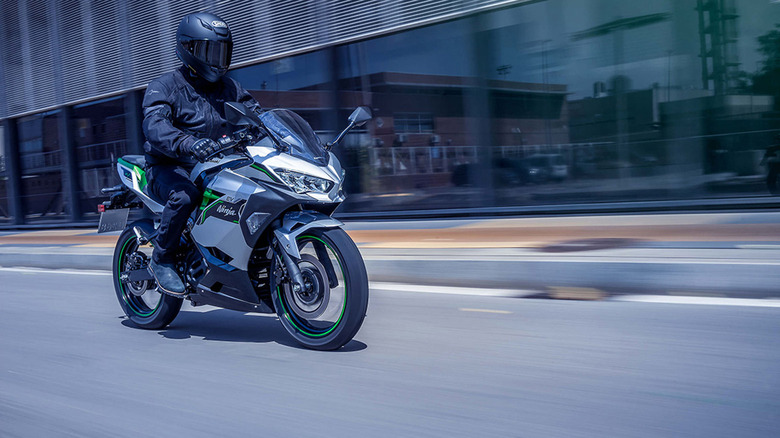 person riding kawasaki ninja e-1